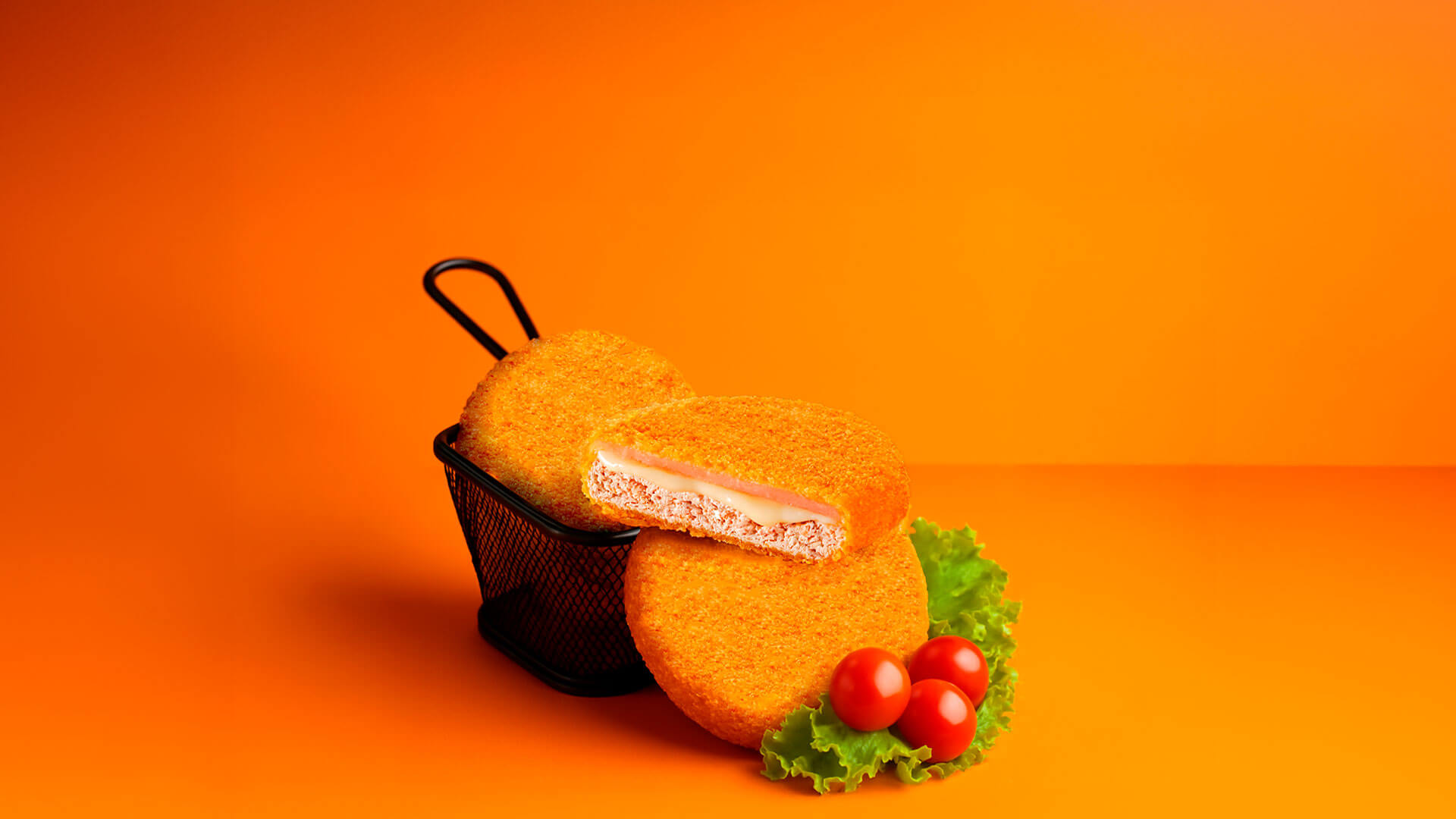 Medallones de Pollo con Jamón y Queso cortados por la mitad